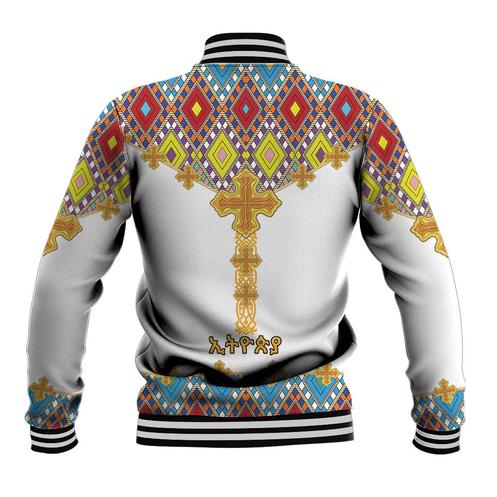 White baseball jacket with colorful diamond pattern, golden cross on back, ribbed collar and cuffs