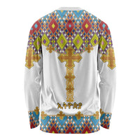 White long-sleeve shirt with colorful cross and diamond tile pattern, back view