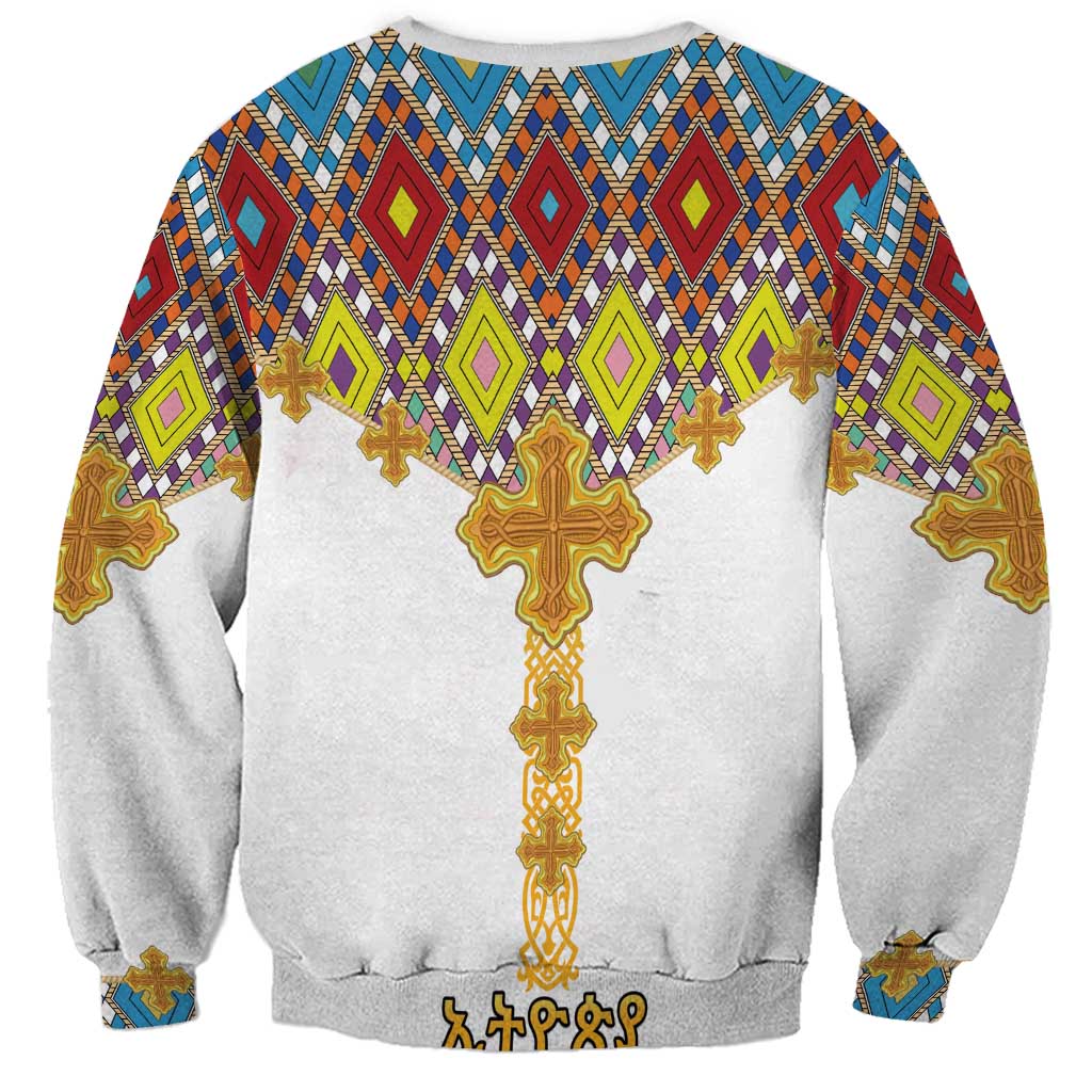 Unisex white sweatshirt back with colorful geometric cross pattern and gold cross graphic
