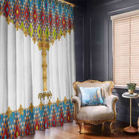 White window curtains with diamond cross motif, gold trim, and scalloped patterned valance