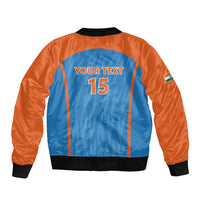 Bomber jacket back: orange sleeves, blue panel, ribbed black hem; YOUR TEXT 15