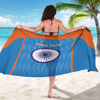 Blue sarong with orange trim, round India emblem and 'YOUR TEXT' across center