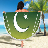 Green round beach blanket with white crescent and star print, fringe border
