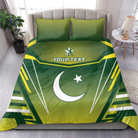 Green duvet and pillowcases with crescent moon and star, lightning stripe graphics and “YOUR TEXT”