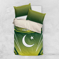 Green bedding set with crescent moon and star design, yellow stripes, “YOUR TEXT”