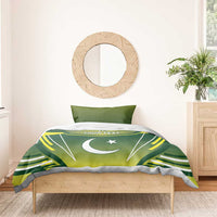 Green duvet with crescent moon and star, yellow lightning stripes, and “YOUR TEXT”