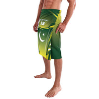 Green and yellow printed lavalava skirt with front slit and star-and-crescent emblem