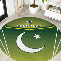 Green round carpet rug with white moon and star graphic, yellow accent lines