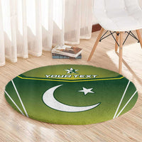 Green round carpet rug with centered moon and star design, "YOUR TEXT"