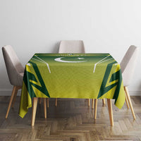 Green custom cricket tablecloth on dining table with star and crescent emblem