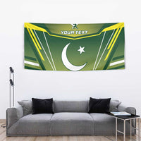 Green wall tapestry featuring crescent moon, star, and bold yellow geometric lines