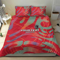 Red custom football bedding set with camo print, two pillowcases, central logo badge.