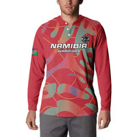 Red long-sleeve button polo with Namibia Warriors logo and green/yellow camo pattern