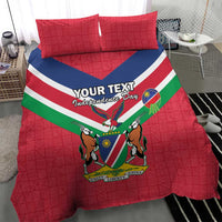 Red Independence Day duvet and two pillows with Namibia flag stripes and coat of arms