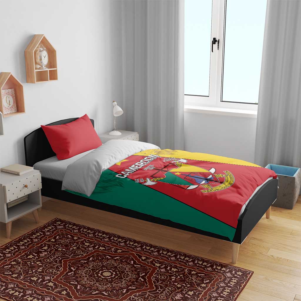 Cameroon bedding set on bed: lion crest duvet with red, green, and yellow panels