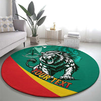 Round green carpet with roaring lion design and “YOUR TEXT” over diagonal red-yellow stripe