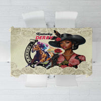 Cream tablecloth with detailed roses and colorful horse-and-derby artwork panel