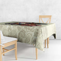 Cream damask rose tablecloth with colorful derby artwork stripe along the edge