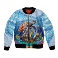 Light blue sea turtle bomber jacket with full-zip front, black ribbed cuffs and hem