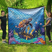 Blue sea turtle quilt with diamond pattern, coral and fish artwork, "Barbados" text