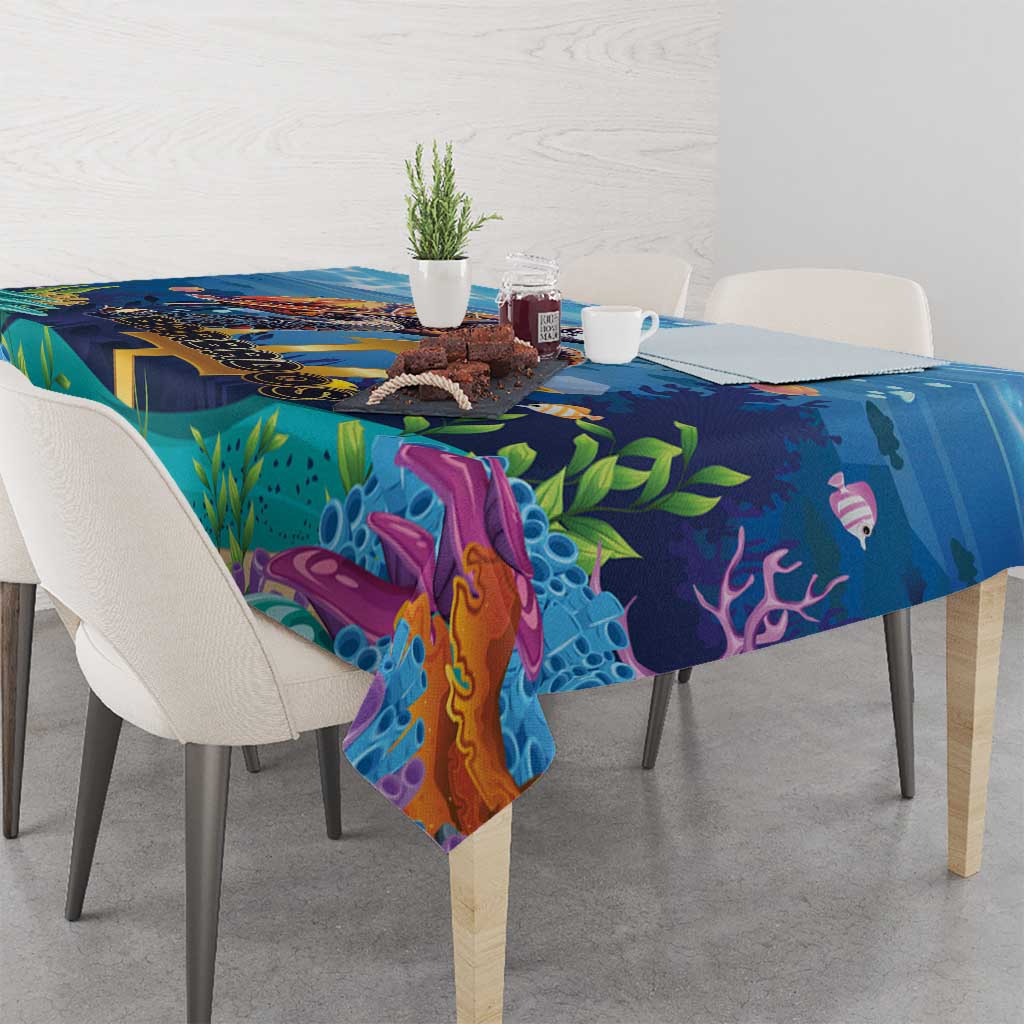Blue ocean sea turtle tablecloth on dining table with chairs, vibrant underwater artwork