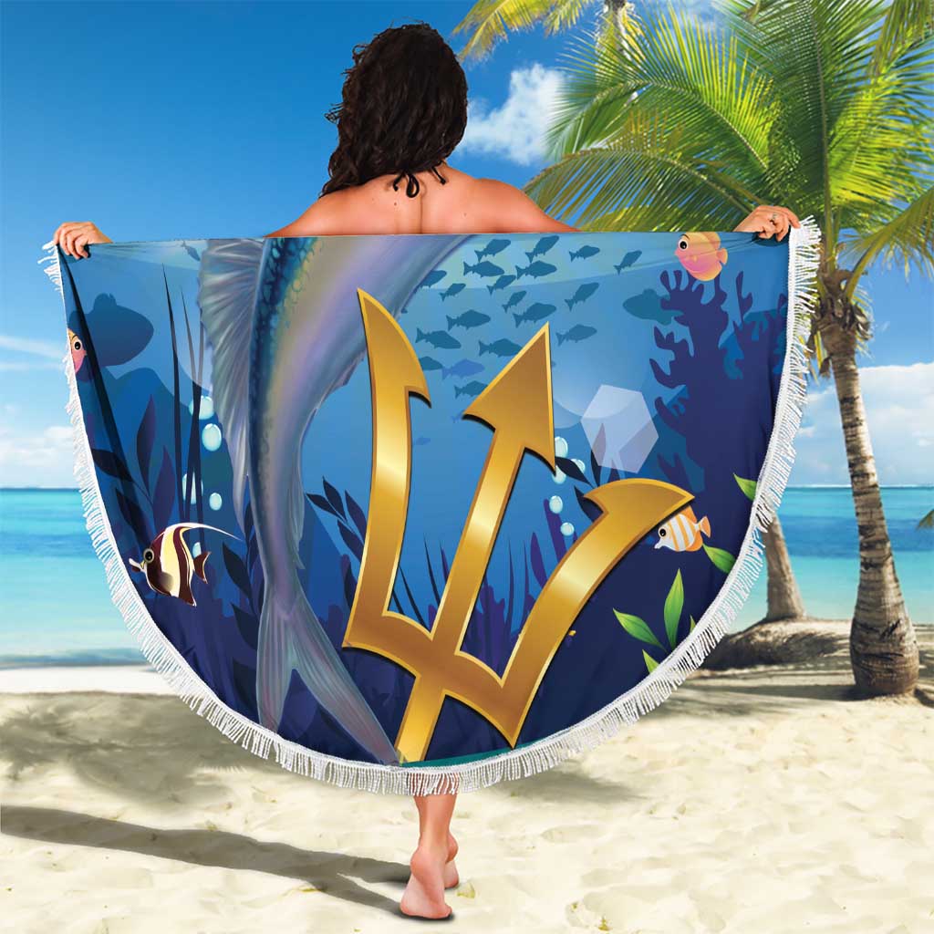 Circular blue beach blanket with colorful flying fish artwork and white tassel fringe