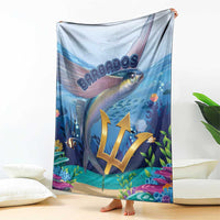 Blue flying fish blanket draped, with gold crest and colorful reef graphics