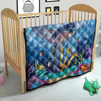Blue ocean quilt for crib with flying fish, gold emblem, coral reef graphics, Barbados logo