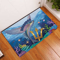 Ocean-style rubber doormat with flying fish and Barbados logo near entry doorway