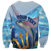 Light blue sweatshirt with flying fish graphic and blue "YOUR TEXTS" lettering