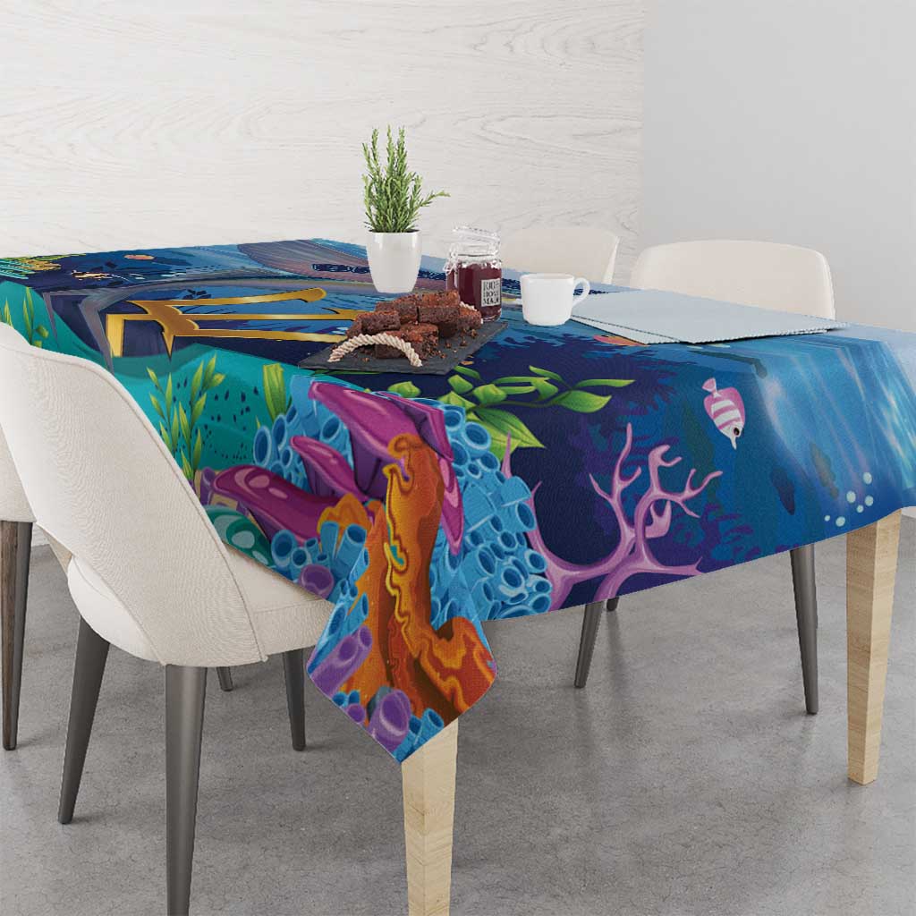 Ocean-style tablecloth with vibrant reef, fish, and sea plants printed in blue and purple