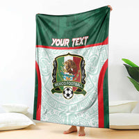 Green football blanket with red edge stripe, Mexico crest and 'Your Text' panel, hanging
