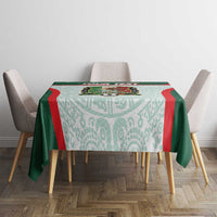Green and aqua Mexico football tablecloth with red border and central crest design
