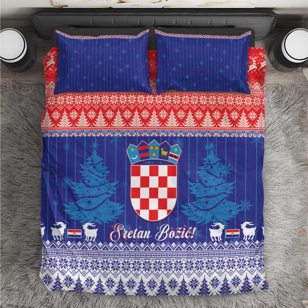 Blue and red Christmas bedding set with crest, pine trees, and two matching pillows