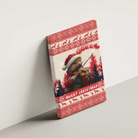 Red Christmas canvas wall art of pine marten playing violin under patterned holiday striping