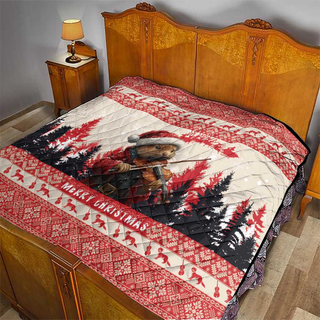 Red Christmas quilt laid on a wooden bed, showing a pine marten playing violin and 'Merry Christmas'.