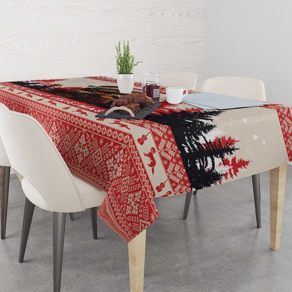 Red and black Christmas tablecloth with pine tree silhouette and snowy motif
