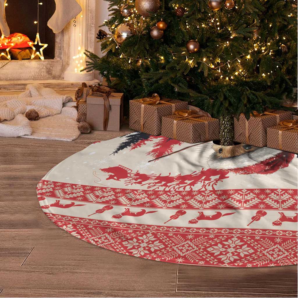 Round Christmas tree skirt with red and white holiday silhouettes pattern