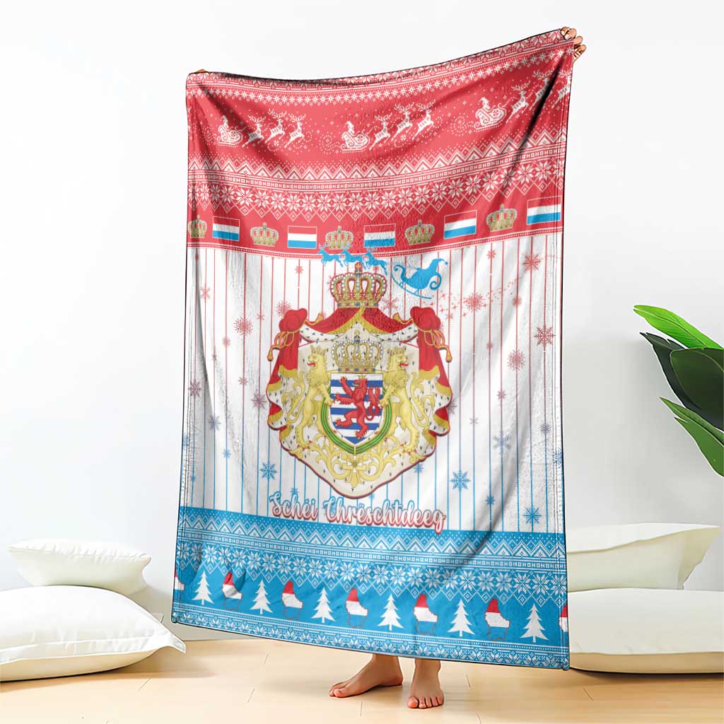 Christmas blanket with red top section and Luxembourg crest, corner draped on floor