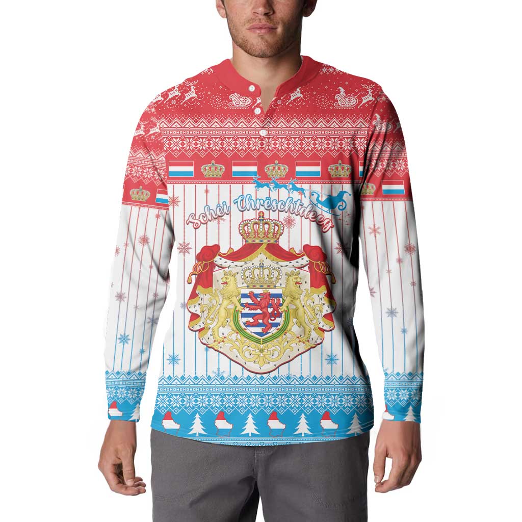 Red button-front sweatshirt coat on model with crest graphic and blue tree hem pattern
