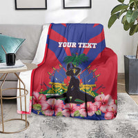Personalized Haiti flag blanket on chair with hibiscus flowers, central silhouette, custom text