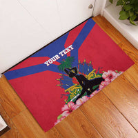 Red and blue rubber doormat with custom text, black figure, palm trees and hibiscus