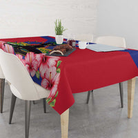Haiti independence tablecloth with red base, pink hibiscus, and blue border panel