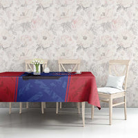 Custom football tablecloth on long table, red cloth with blue center stripe and crest design.