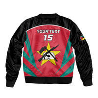 Black bomber jacket back with red-green star graphic, YOUR TEXT 15, sleeve patch
