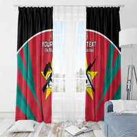 Red football window curtains with Os Mambas text, black player silhouettes, and yellow star emblem