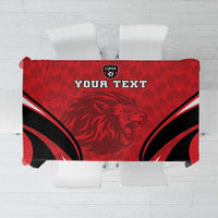 Red football tablecloth with black accents, lion emblem, and bold 'YOUR TEXT' print