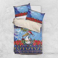 Blue Christmas duvet set with pelican and poinsettia print plus matching pillowcases