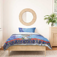 Dark blue Christmas bedding set with pelican and poinsettia flowers, decorative border