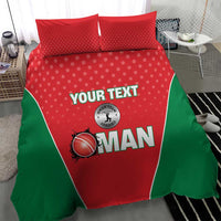 Red and green cricket-themed duvet with two pillows, centered on a bed.